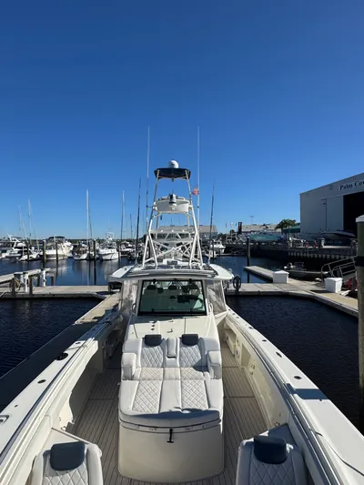 Tradition Yacht Photos Pics 2016 HCB 53 Sue&ntilde;os boat docked at marina under clear sky.
