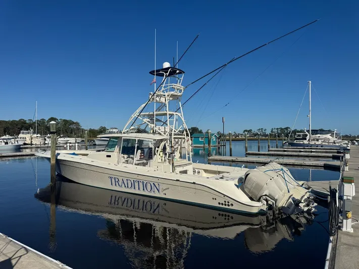 Tradition Yacht Photos Pics HCB 53 Sueños 2016 boat docked in harbor under clear sky.