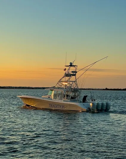 Tradition Yacht Photos Pics HCB 53 Sueños boat on water at sunset, 2016 model.