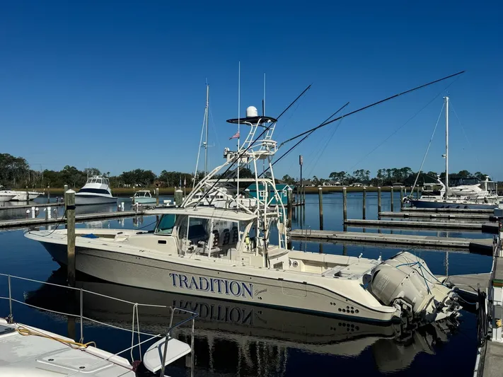 Tradition Yacht Photos Pics HCB 53 Sueños 2016 boat docked in harbor under clear sky.