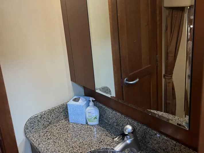  Yacht Photos Pics Bathroom vanity with granite countertop in 2006 Sea Ray 48 Sundancer yacht.