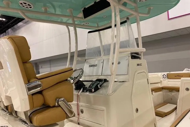  Yacht Photos Pics 2026 Sea Chaser 30 HFC CC boat interior with helm and seating.