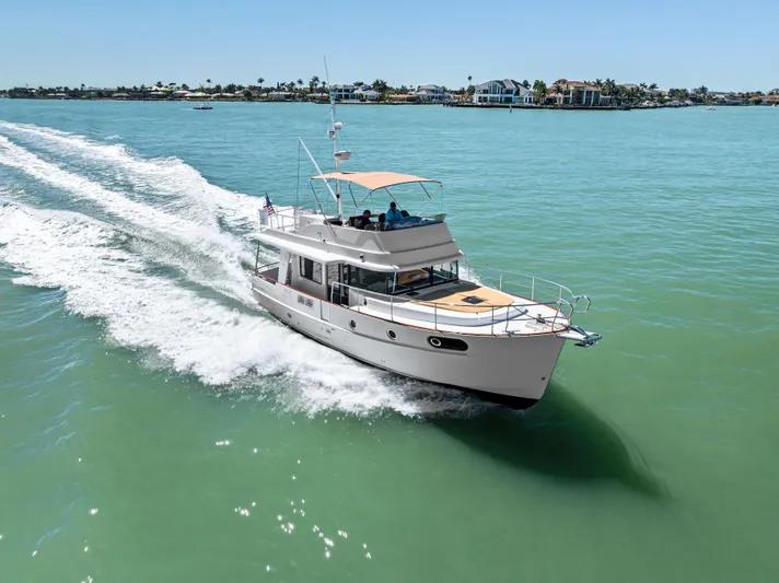 Lady Di Yacht Photos Pics 2012 Beneteau Swift Trawler 44 cruising on turquoise waters.