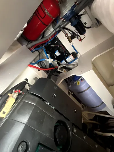 Vamanos Yacht Photos Pics Engine room of 2023 Beneteau Gran Turismo 41 with visible components and wiring.