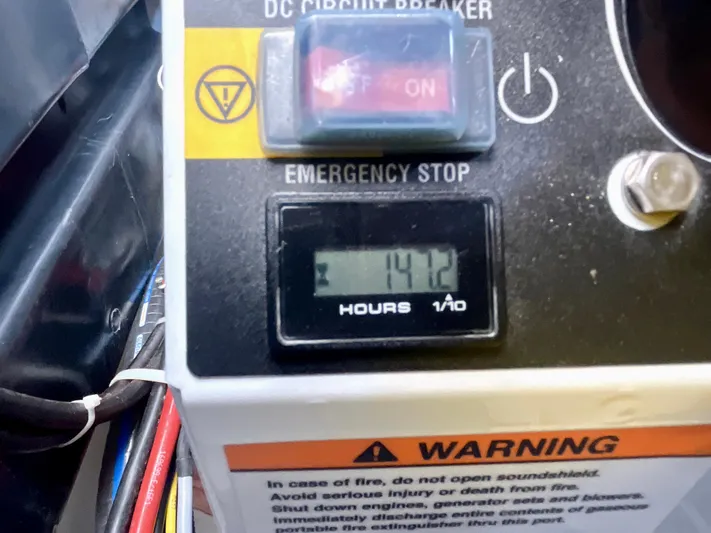 Vamanos Yacht Photos Pics Close-up of Beneteau Gran Turismo 41 control panel, showing 141.2 hours on the meter.