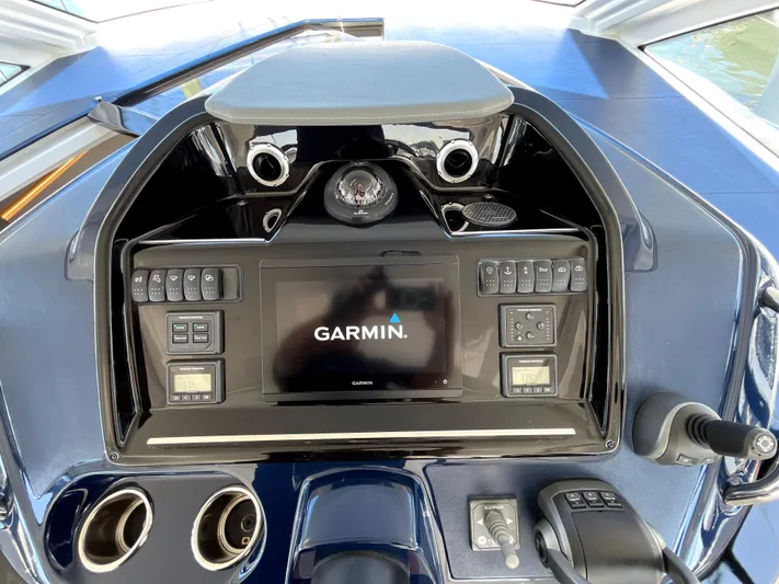 Vamanos Yacht Photos Pics 2023 Beneteau Gran Turismo 41 helm with Garmin navigation system.