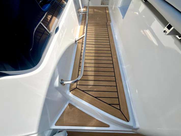 Vamanos Yacht Photos Pics Teak deck detail on 2023 Beneteau Gran Turismo 41 yacht.