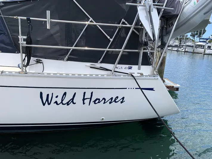 Wild Horses Yacht Photos Pics Saga 43 sailboat named "Wild Horses" docked in a marina, 2002 model.