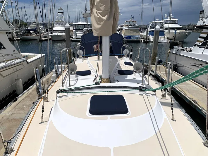 Wild Horses Yacht Photos Pics Deck view of a 2002 Saga 43 sailboat docked at a marina.