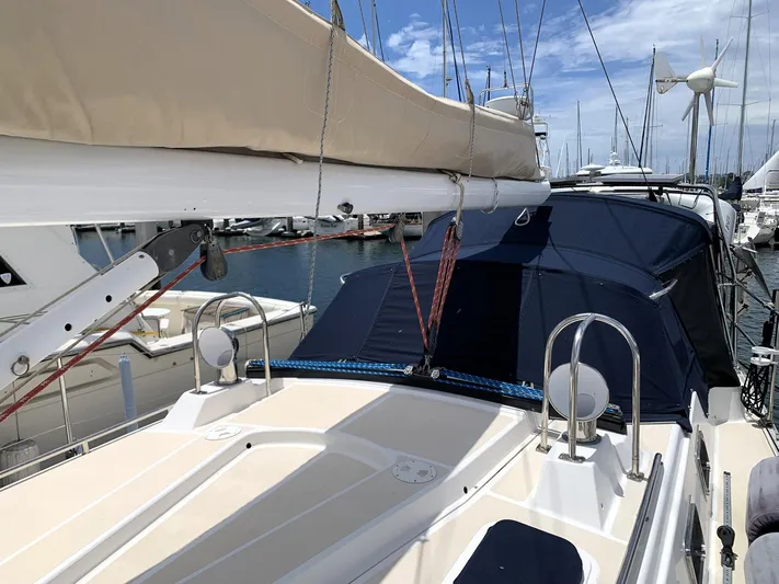 Wild Horses Yacht Photos Pics Saga 43 sailboat, 2002 model, docked at marina with clear skies and calm waters.