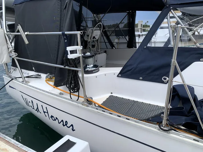 Wild Horses Yacht Photos Pics Saga 43 sailboat from 2002 named "Wild Horses" docked at a marina.