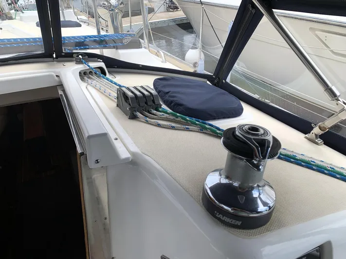 Wild Horses Yacht Photos Pics Deck of 2002 Saga 43 sailboat with winch and ropes in marina setting.