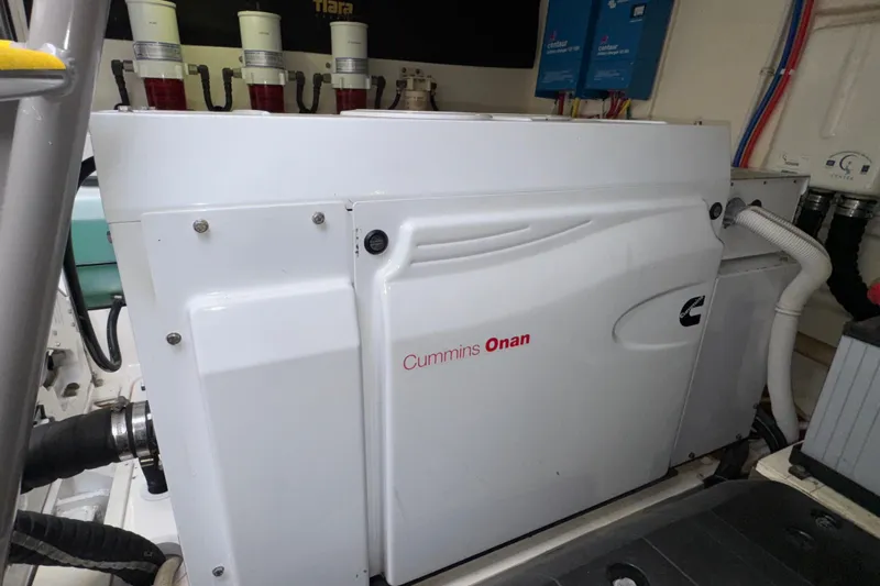  Yacht Photos Pics Cummins Onan generator in 2014 Tiara Yachts 5800 Sovran engine room.