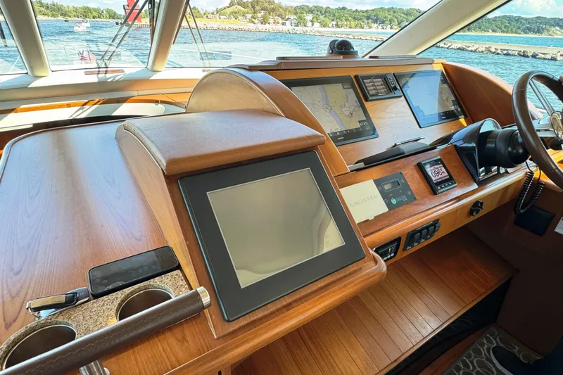  Yacht Photos Pics Helm of 2014 Tiara Yachts 5800 Sovran with navigation screens and controls.