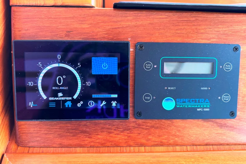  Yacht Photos Pics Control panels on 2014 Tiara Yachts 5800 Sovran, featuring Seakeeper and Spectra Watermakers systems.