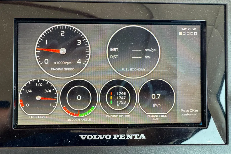  Yacht Photos Pics Volvo Penta display on 2014 Tiara Yachts 5800 Sovran showing engine metrics and fuel economy.