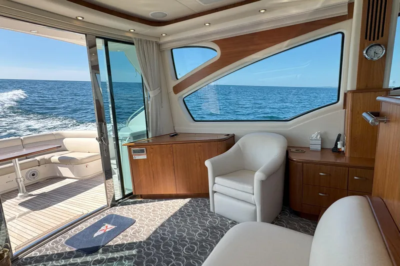  Yacht Photos Pics Luxurious interior of 2014 Tiara Yachts 5800 Sovran with ocean view.