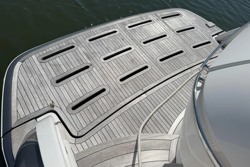  Yacht Photos Pics 2014 Tiara Yachts 5800 Sovran swim platform with teak decking and water view.