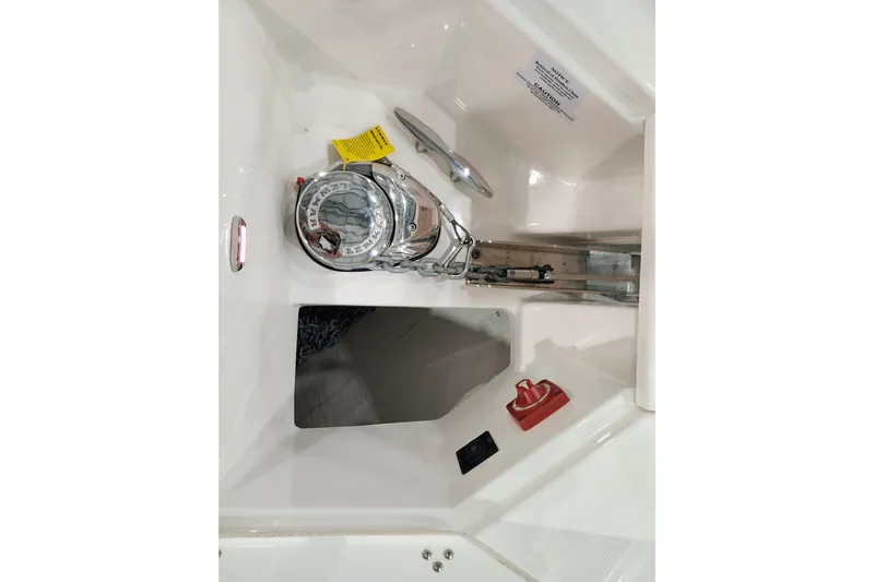  Yacht Photos Pics 2025 Regal 36 XO boat anchor compartment with winch and control panel.