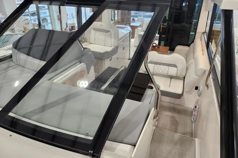  Yacht Photos Pics 2025 Regal 36 XO boat interior with luxurious seating and modern design.