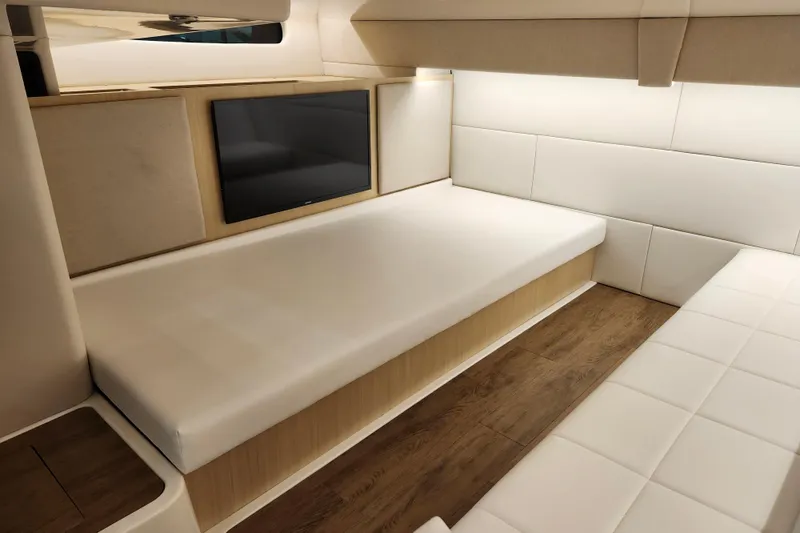  Yacht Photos Pics 2025 Regal 36 XO yacht interior with modern seating and wall-mounted TV.
