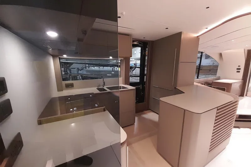  Yacht Photos Pics Luxurious interior of 2026 Princess Y80 yacht, featuring modern kitchen design.