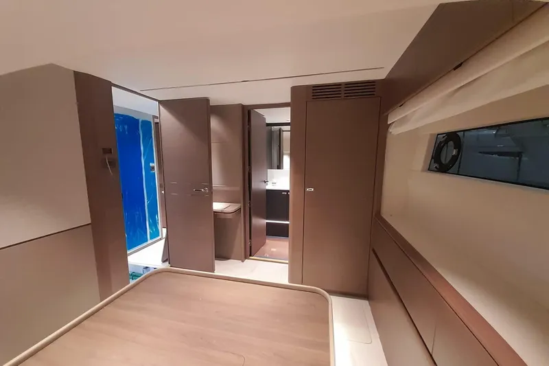  Yacht Photos Pics Interior of 2026 Princess Y80 yacht, featuring modern design and wood finishes.