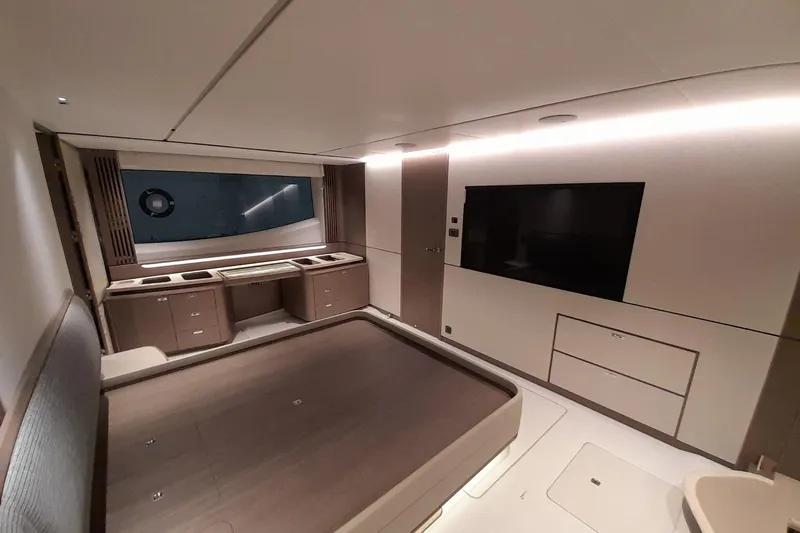  Yacht Photos Pics Luxurious interior of 2026 Princess Y80 yacht with modern design and large TV.