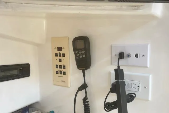 Unreel Yacht Photos Pics Control panel and communication equipment inside a 2001 Cabo 31 Express boat.