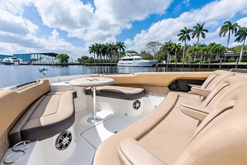  Yacht Photos Pics 2019 Sea Ray SLX 400 OB luxury boat interior with plush seating and scenic waterfront view.
