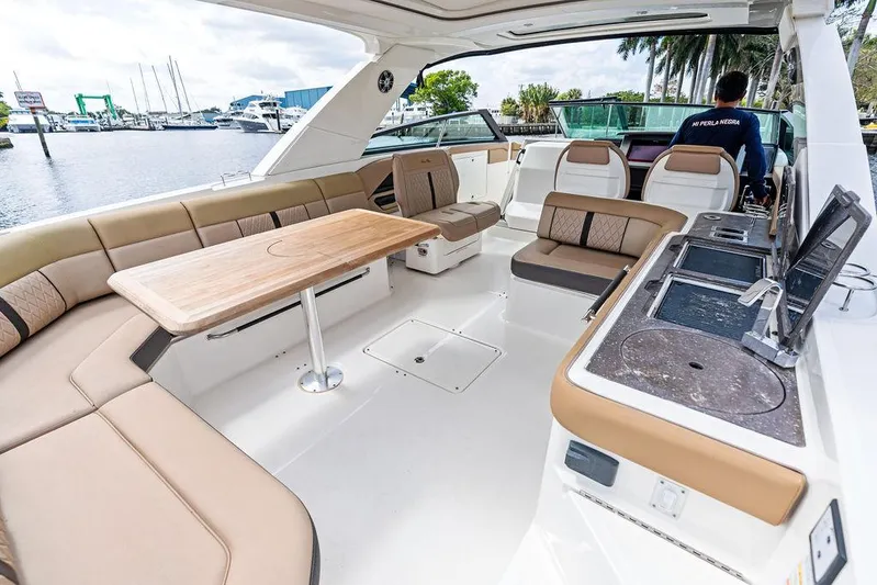  Yacht Photos Pics 2019 Sea Ray SLX 400 OB boat interior with spacious seating and modern amenities.