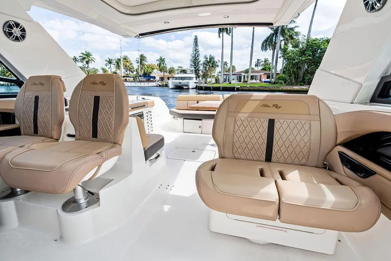  Yacht Photos Pics Luxurious interior of 2019 Sea Ray SLX 400 OB boat with plush seating.
