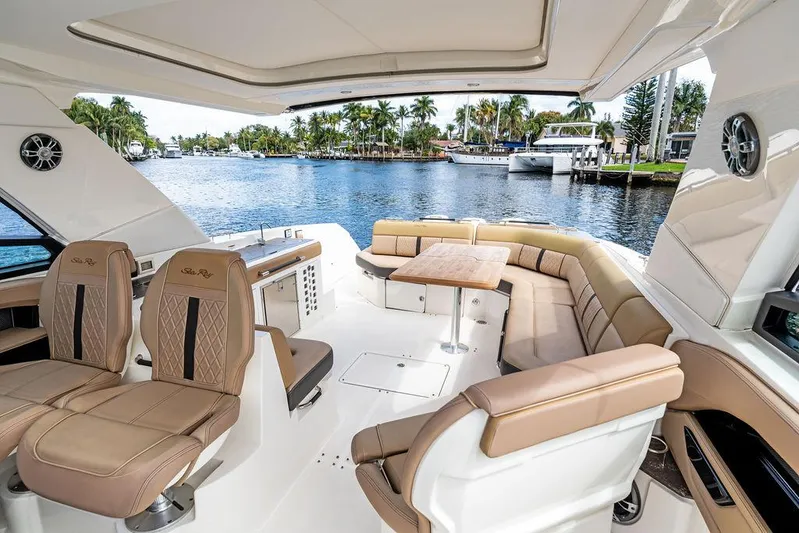  Yacht Photos Pics 2019 Sea Ray SLX 400 OB boat interior with luxurious seating and waterfront view.