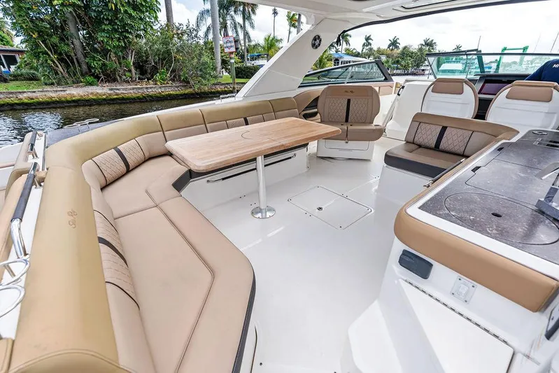  Yacht Photos Pics 2019 Sea Ray SLX 400 OB boat interior with spacious seating and elegant design.