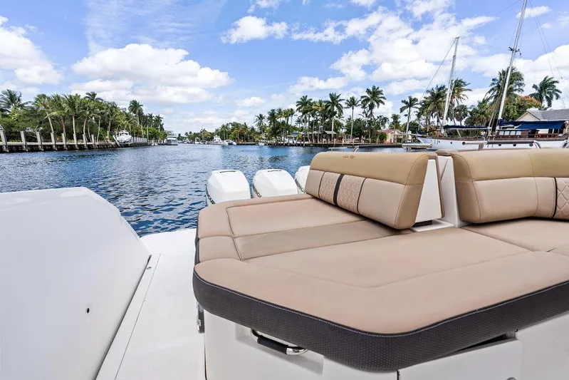  Yacht Photos Pics 2019 Sea Ray SLX 400 OB boat with luxurious seating, cruising on a scenic waterway.