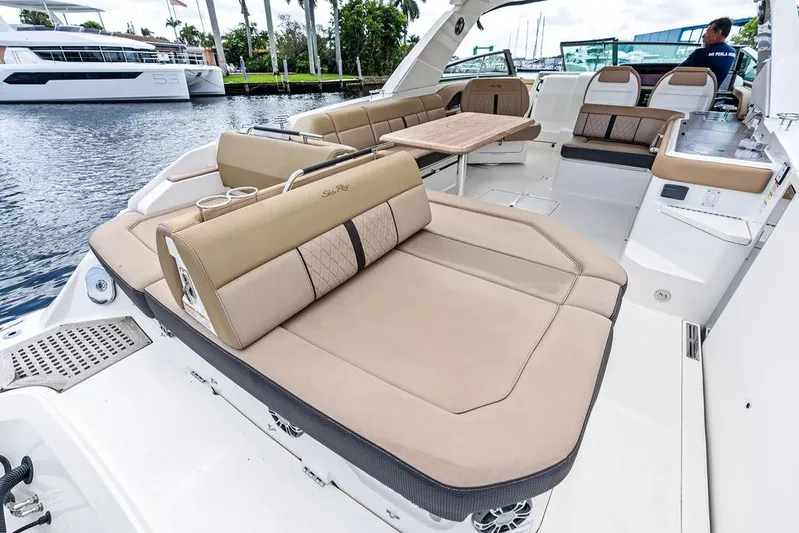  Yacht Photos Pics 2019 Sea Ray SLX 400 OB boat interior with luxurious seating and spacious deck.