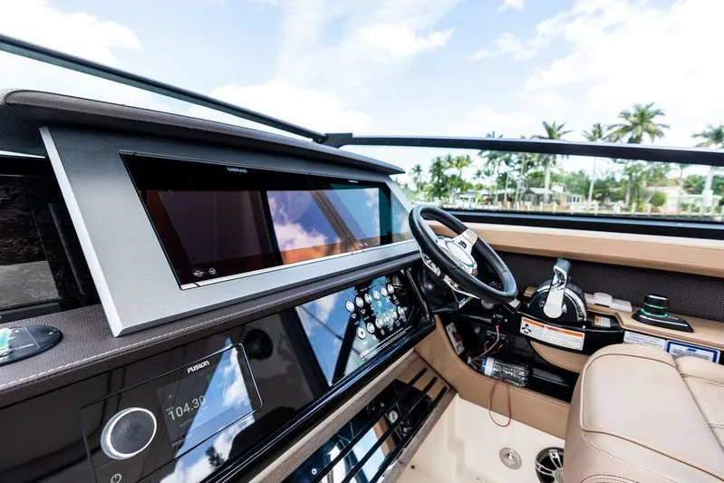  Yacht Photos Pics 2019 Sea Ray SLX 400 OB helm with modern controls and luxurious seating.