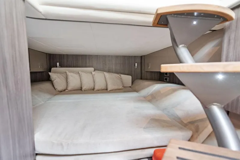  Yacht Photos Pics 2019 Sea Ray SLX 400 OB cabin interior with cozy bedding and modern design.