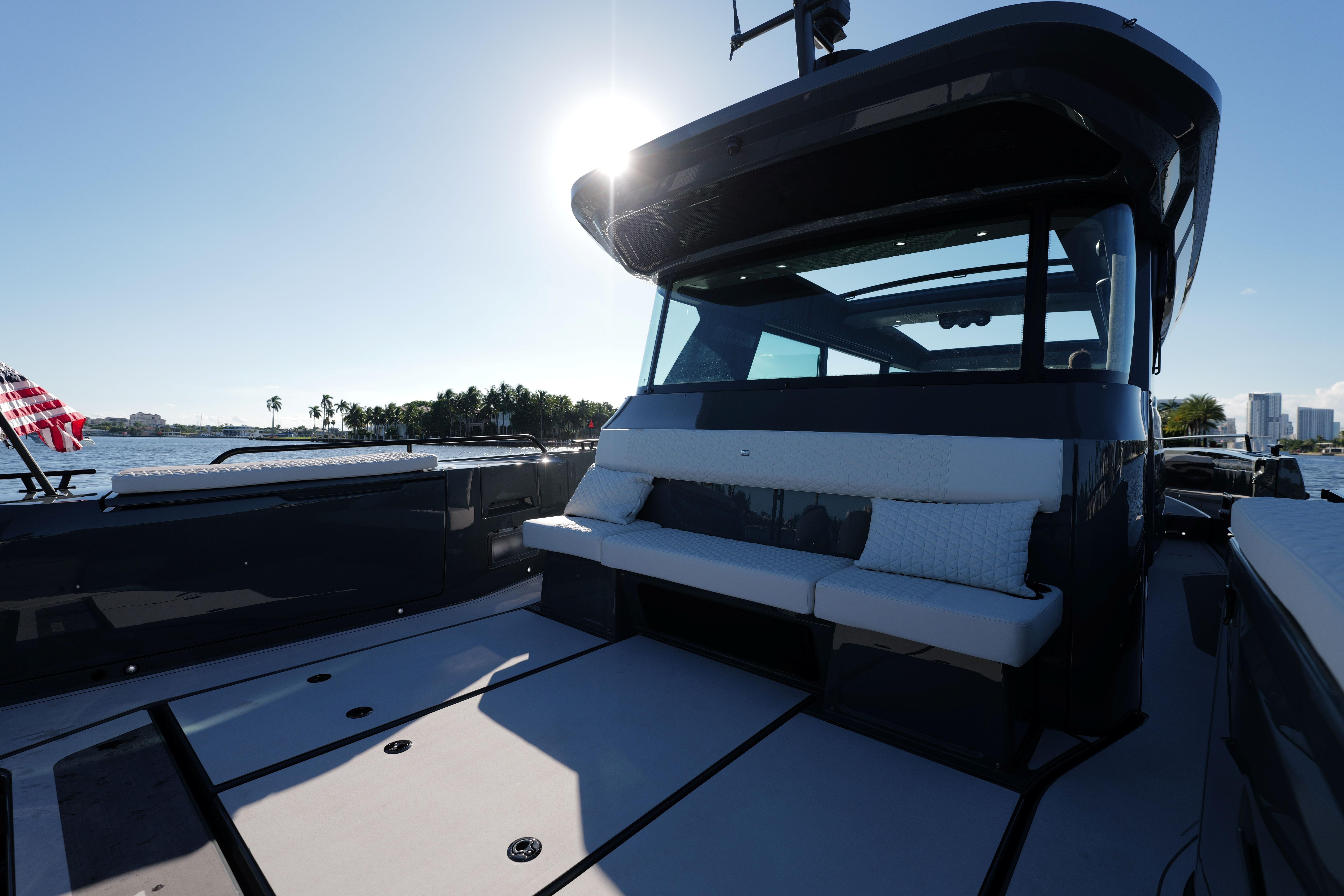 Luxurious 2026 BRABUS 1500 yacht with sleek design and spacious deck under clear sky.