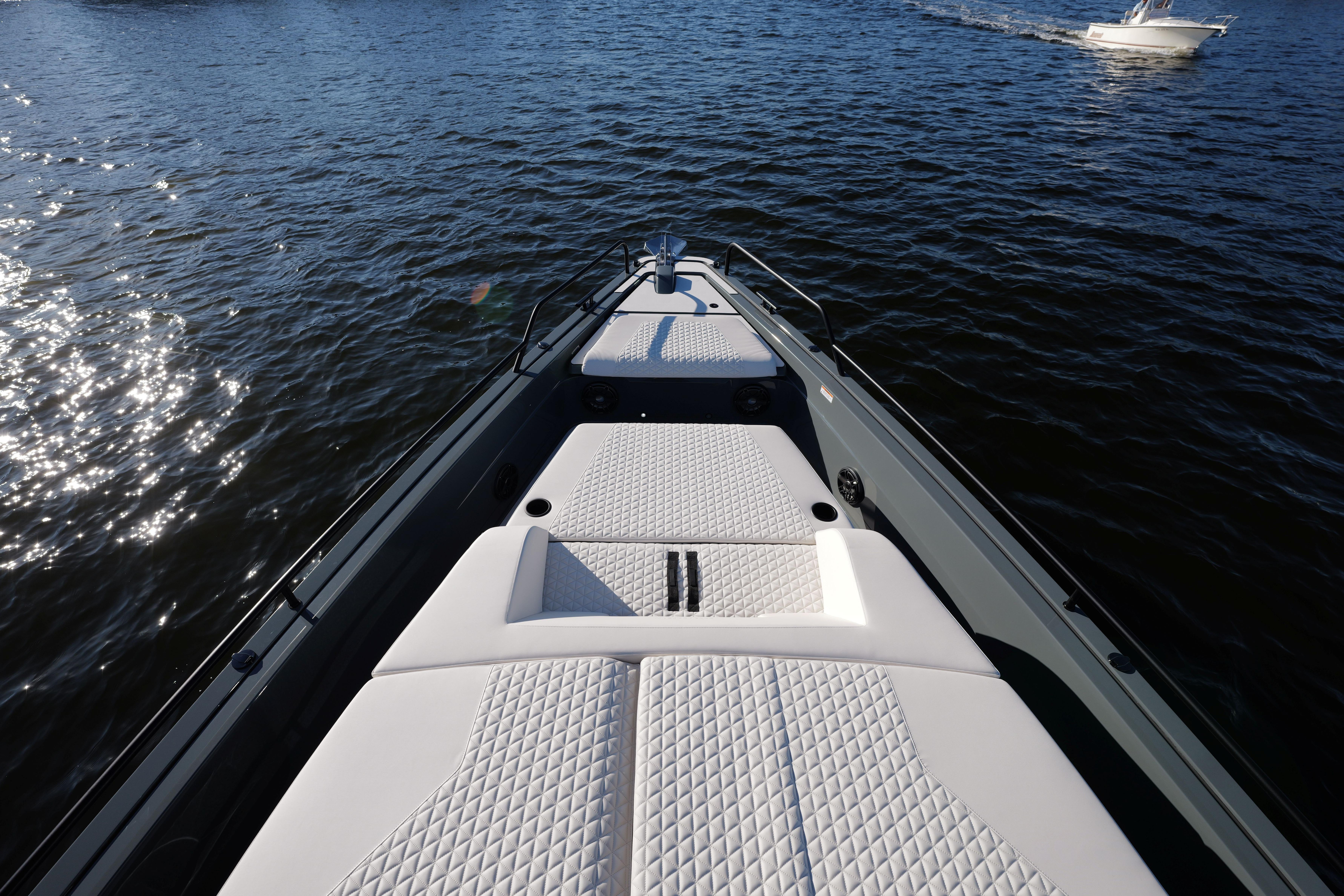 Luxurious 2026 BRABUS 1500 boat with white quilted seating on open water.