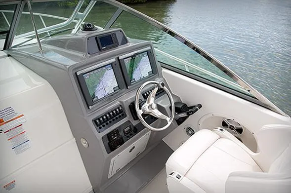  Yacht Photos Pics Manufacturer Provided Image: 2015 Robalo R305 Walkaround helm with dual navigation screens and steering wheel.