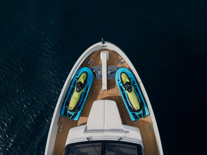 X99 Fast Yacht Photos Pics Top view of 2026 Extra X99 FAST yacht with two jet skis on deck.