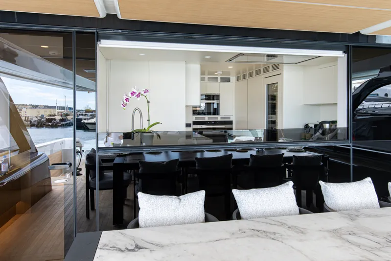 X99 Fast Yacht Photos Pics Modern yacht kitchen and dining area on the 2026 Extra X99 FAST.