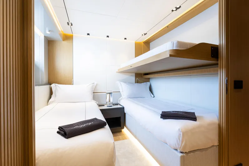 X99 Fast Yacht Photos Pics Modern twin cabin on the 2026 Extra X99 FAST yacht with sleek design and cozy beds.