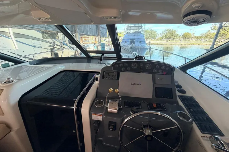  Yacht Photos Pics 2004 Tiara Yachts 3600 Sovran helm with Garmin navigation, docked at marina.