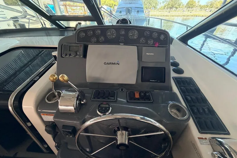  Yacht Photos Pics 2004 Tiara Yachts 3600 Sovran helm with Garmin navigation and control panel.