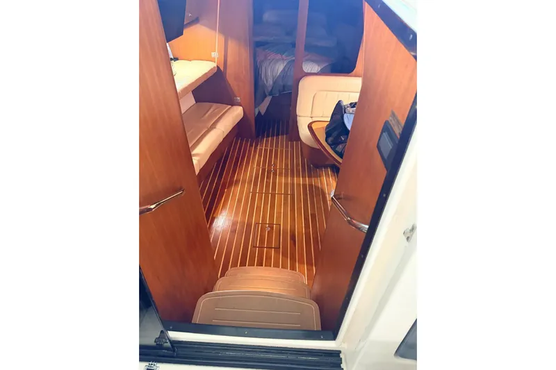  Yacht Photos Pics Interior of 2004 Tiara Yachts 3600 Sovran with wooden flooring and seating area.