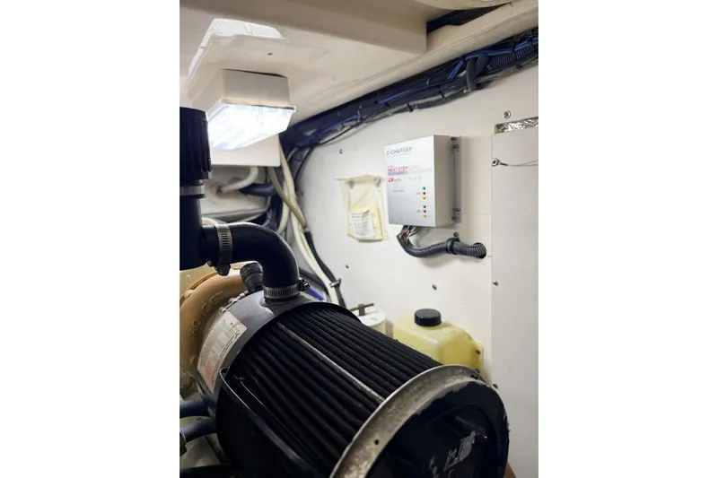  Yacht Photos Pics Engine room of 2004 Tiara Yachts 3600 Sovran, featuring equipment and wiring.