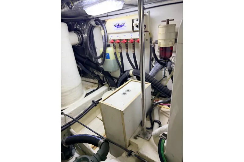  Yacht Photos Pics Engine room of 2004 Tiara Yachts 3600 Sovran, showcasing mechanical components and wiring.