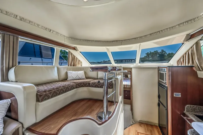 Lil Peace Yacht Photos Pics Interior of a 2005 Sea Ray 420 Sedan Bridge yacht with panoramic windows.